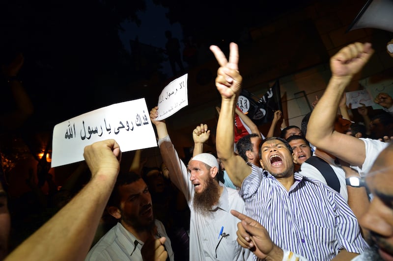 articles/2012/09/12/egypt-s-morsi-using-1979-strategy-of-iran-s-khomeini/cairo-protests_aoukob
