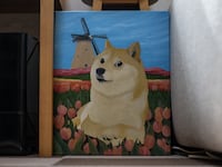 A painting of Japanese Shiba Inu dog Kabosu, best known as the logo of cryptocurrency Dogecoin, at the home of her owner Atsuko Sato in Sakura, Chiba prefecture, east of Tokyo.