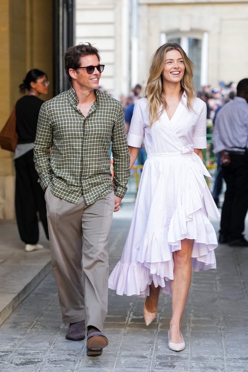 James Marsden and Frederique Brons walked in hand in hand when they arrived at the Dior Homme Menswear Spring/Summer 2027 show during Paris Fashion Week on June 24, 2026.