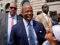 New York City Mayor Eric Adams smiles outside the 40th precinct after he announced First Deputy Commissioner Edward Caban as his choice to be the next New York City Police Department (NYPD) Commissioner