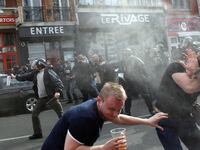articles/2016/06/15/the-kremlin-backs-brawling-soccer-hooligans-in-france/160615-nemetsova-russia-soccer-tease_smpesl