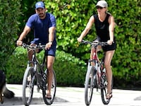 SURFSIDE, FL - JULY 14: Joaquim Valente and Gisele Bündchen are seen on a bike ride on July 14, 2024 in Surfside, Florida. (Photo by MEGA/GC Images)
