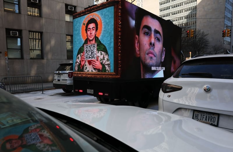 A digital billboard truck displays images of Luigi Manigione near Manhattan Criminal Court on February 21, 2025 in New York City.