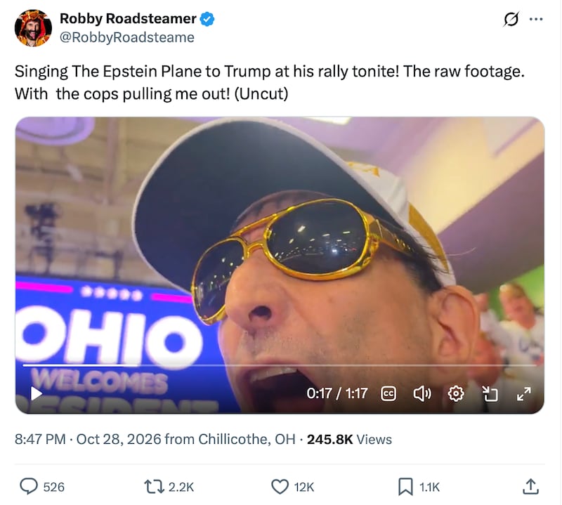 The heckler wore a pro-Trump hat to help fit in.