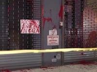 AOC's campaign office vandalized with red paint.