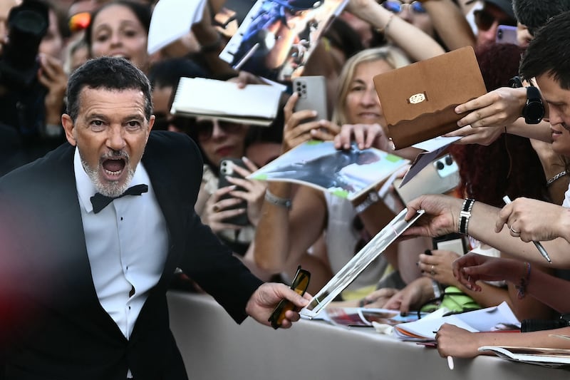 Antonio Banderas reacts on the red carpet during the Venice Film Festival on August 30, 2024.