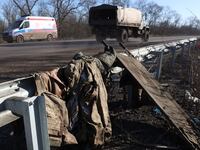 A stretcher and discarded Ukrainian military equipment on a roadside not far from Bakhmut.