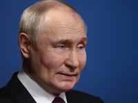 Russian President Vladimir Putin smiles during his meeting with students at the Harbin Institute of Technology, May 17, 2024, in Harbin, China.