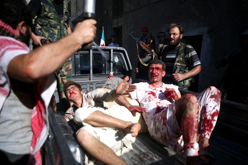 articles/2012/08/15/despite-pledge-syrian-rebels-continue-to-torture/dettmer-detention-center-syria_p1qhyw