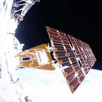 A view of the Link spacecraft over Earth.
