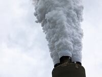 Exhaust rises from the stacks of a West Virginia power station.