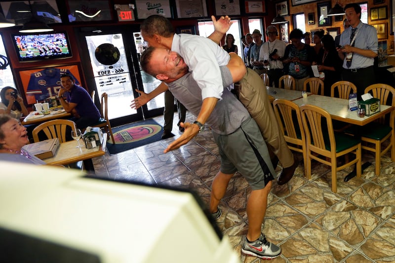 articles/2012/09/11/pizza-shop-owner-scott-van-duzer-on-bear-hugging-president-obama/touchy-campaign-moments-obama-hug_zaaj7t
