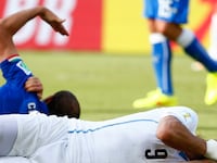 articles/2014/06/24/luis-suarez-uruguay-s-notorious-soccer-vampire-strikes-again-biting-italian-in-world-cup-win/140624-varadarajan-soccer-bite-tease_j1typr