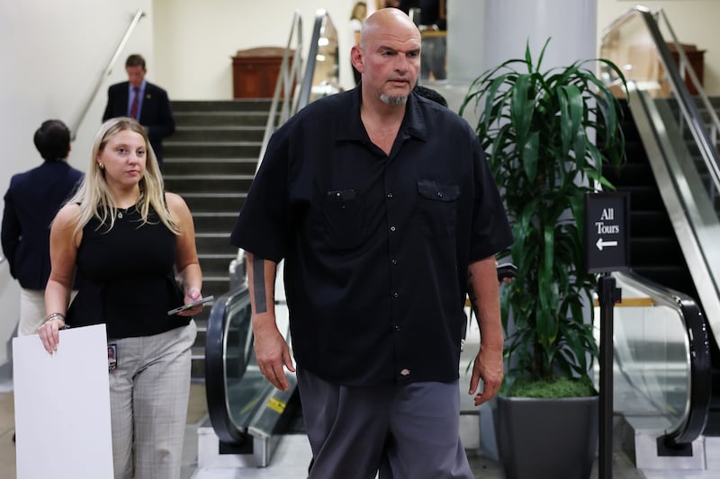 Democratic Sen. John Fetterman, pictured on Capitol Hill on October 1, was hospitalized after falling near his home in Pennsylvania, his office said.