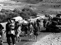 articles/2012/04/16/of-herrings-and-elephants-benny-morris-and-palestinian-rejectionism/refugees-palestine-1948_ilbfip