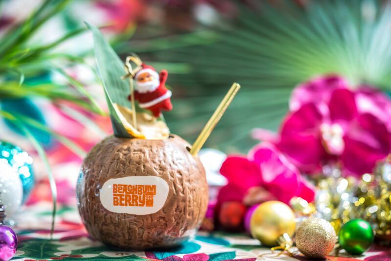 articles/2016/12/22/over-the-top-restaurant-and-bar-holiday-decorations/161222-Rothbaum-Sippin-Santa_t6cqbj