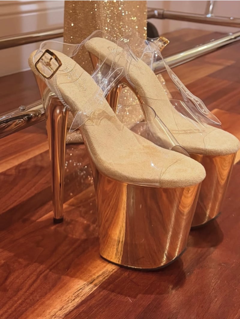 Kardashian added some height with extra-tall platform heels.