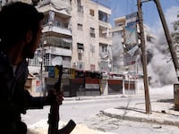 articles/2012/08/18/syrian-rebels-outgunned-but-unbroken-in-fight-for-aleppo/syria-aleppo-banco_biysuw