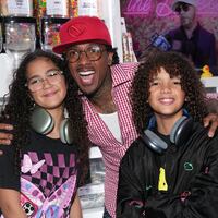 NEW YORK, NEW YORK - AUGUST 11: Moroccan Cannon, Nick Cannon and Monroe Cannon attend the Natti Natasha & Nick Cannon host Sugar Factory in Times Square on August 11, 2023 in New York City.