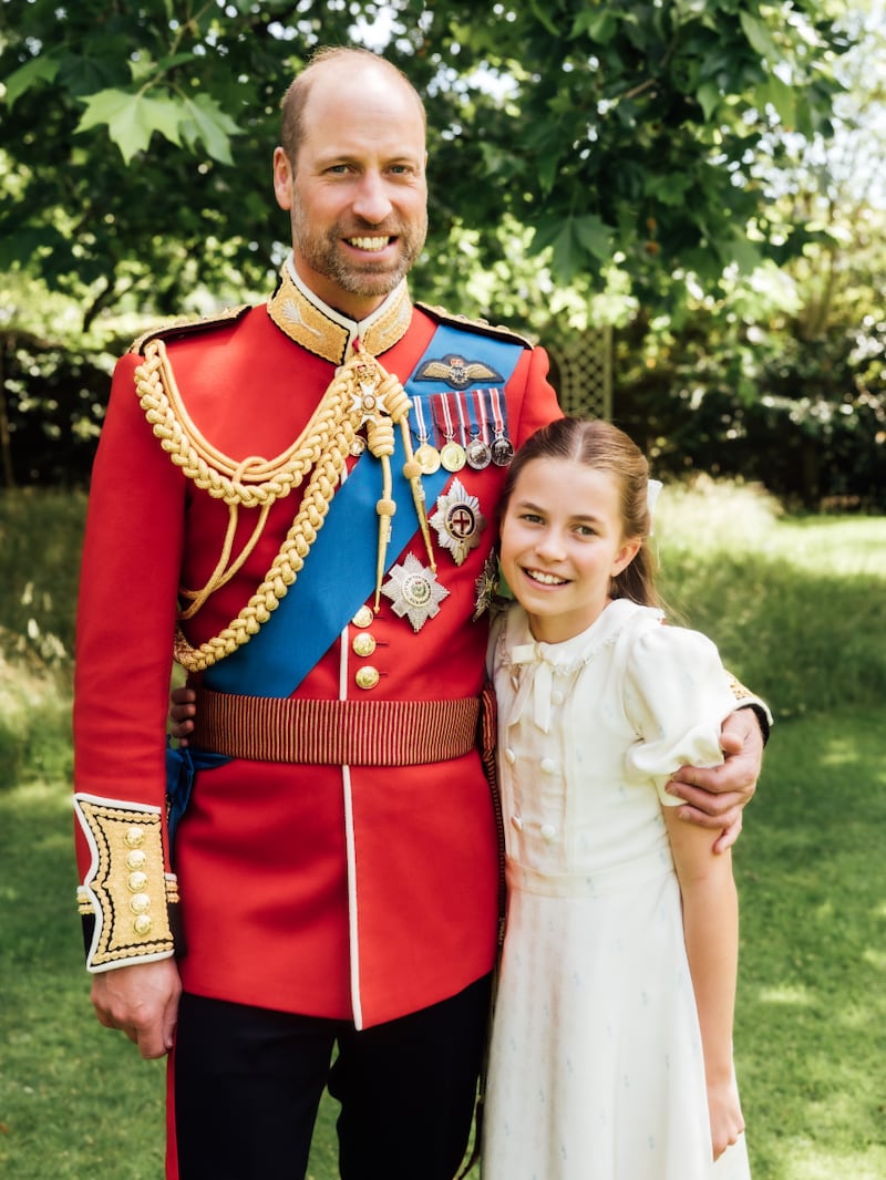 Prince William and his daughter appear arm in arm in a photo posted to Instagram for Father’s Day and William’s birthday.