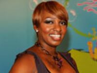 articles/2009/08/10/the-housewife-who-keeps-it-real/dana-nene_42619_stbigq