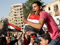 articles/2013/10/15/defeating-the-arab-spring-syndrome-of-self-defeat/tahrir-square-protestor-openz_vp9t7u