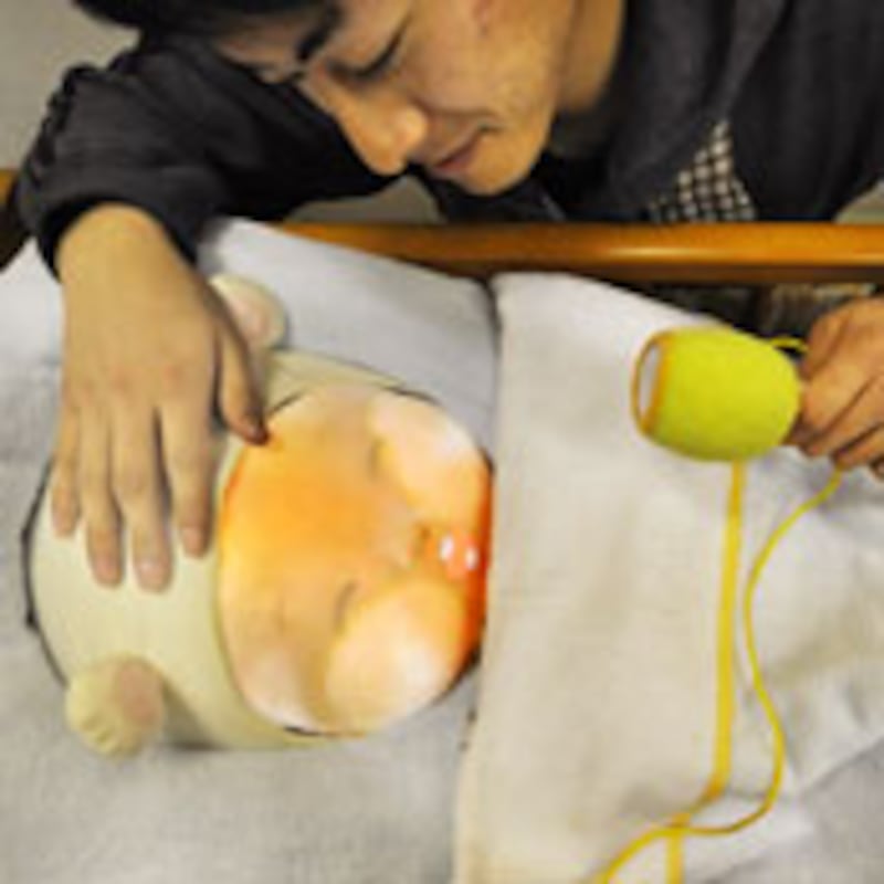 articles/2010/03/17/birth-of-the-robot-baby/grunwald-robot-baby_88576_sqwtz9