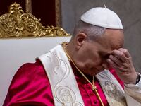 Pope Leo sitting down.