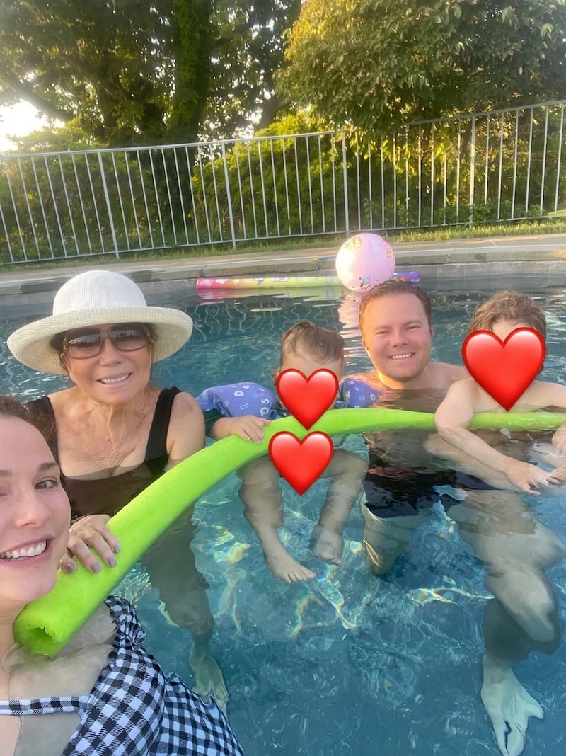 Kathie Gifford poses for a photo with her daughter Erika and her grandchildren in a swimming pool in a photo posted on Erika’s Instagram.
