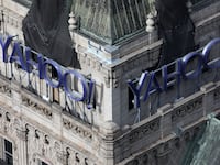 The Yahoo! company logo appears on the old New York Times building,