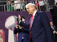 Donald Trump walks onto the field prior to Super Bowl LIX between the Kansas City Chiefs and the Philadelphia Eagles at Caesars Superdome on February 09, 2025 in New Orleans, Louisiana.