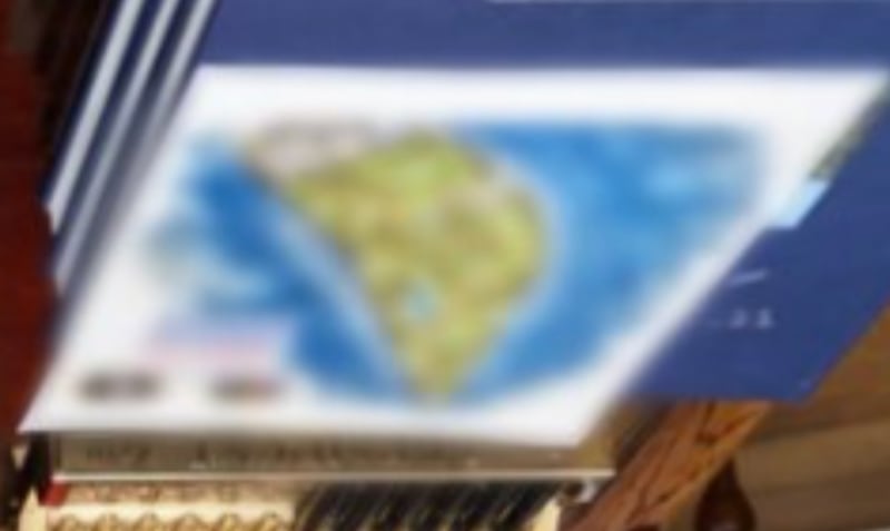 A close-up at the blurred image from Katie Zacharia's X post.