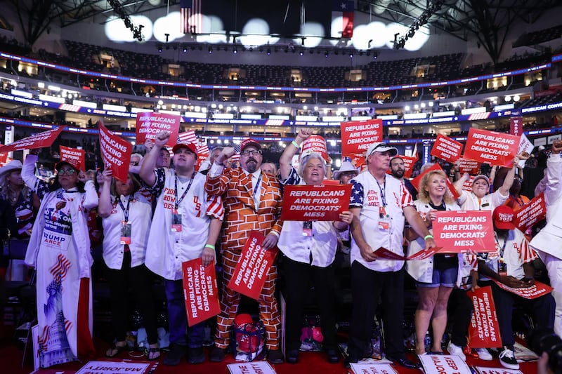 Attendees, calling themselves the "Front Row Joes," cheer during the first day of the Republican National Midterm Convention at the American Airlines Center in Dallas, Texas on September 9, 2026. US Republicans open an extraordinary midterm convention in Dallas on September 9 betting that putting Donald Trump at the center of their campaign can rescue a party facing grim election forecasts -- despite the president's negative approval ratings. (Photo by Blake Fagan / AFP via Getty Images)