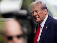 Former U.S. President Donald Trump gestures as he walks on the day of his hush money criminal trial, outside Trump Tower, in New York City, U.S., April 15, 2024.