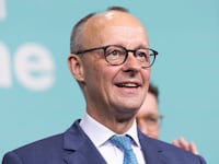 Friedrich Merz, chancellor candidate of Germany's Christian Democrats (CDU/CSU), reacts at CDU headquarters following the announcement of initial results in snap federal parliamentary elections on February 23, 2025 in Berlin, Germany.