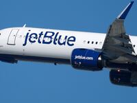 LOS ANGELES, CALIFORNIA - OCTOBER 17: A JetBlue Airways Airbus A321 airplane departs from Los Angeles International Airport en route to New York on October 17, 2025 in Los Angeles, California. (Photo by Kevin Carter/Getty Images)