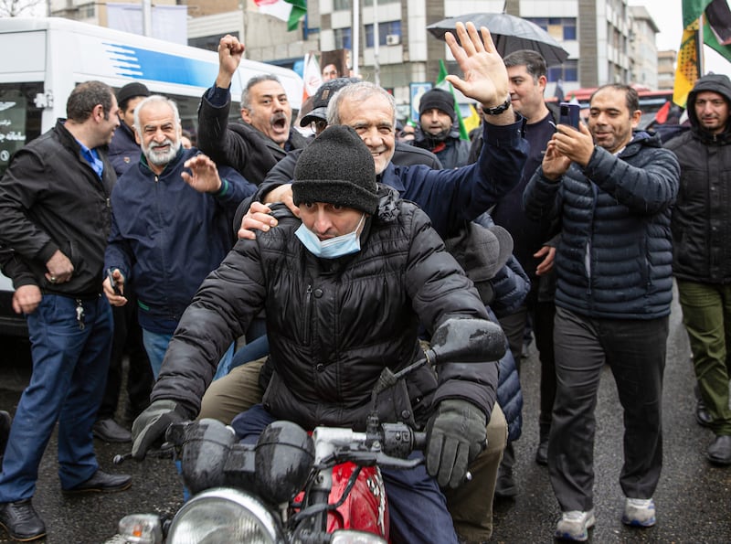 TEHRAN, IRAN - MARCH 13: Iranian President Masoud Pezeshkian attends the Quds Day march in Tehran, Iran, on March 13, 2026. (Photo by Hassan Ghaedi/Anadolu via Getty Images)
