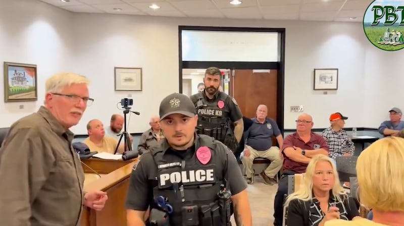 Policr at meeting.