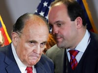 A picture of former New York City Mayor Rudy Giuliani and Trump campaign advisor Boris Epshteyn, who might possibly fit the description of co-conspirator 6 in Trump’s indictment over his efforts to overturn the 2020 election.