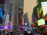 Times Square in Manhattan is shrouded in haze and smoke which drifted south from wildfires in Canada, in New York City, New York, U.S., June 6, 2023.
