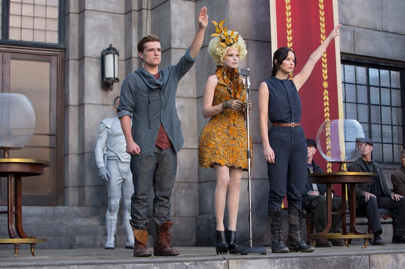 Josh Hutcherson, Elizabeth Banks, and Jennifer Lawrence in The Hunger Games: Catching Fire.