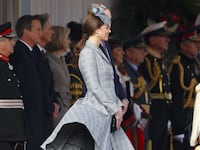 articles/2014/10/22/kate-sweetie-get-some-hem-weights/141022-sykes-middleton-skirt-tease_kuzn94