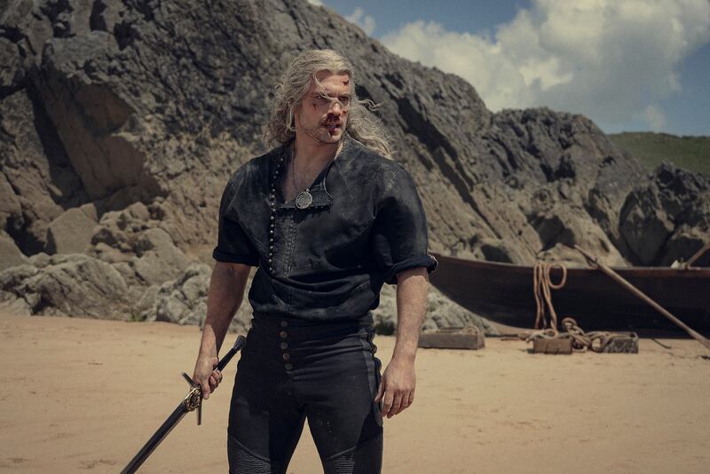 A production still of Henry Cavill in season 3 of The Witcher.