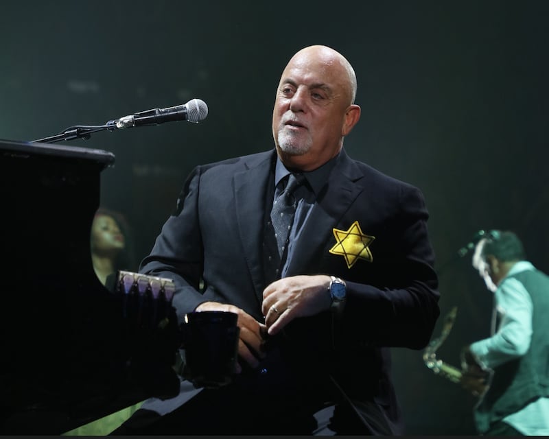 Billy Joel wears a jacket with the Star of David during the encore of his 43rd sold out show at Madison Square Garden on August 21, 2017