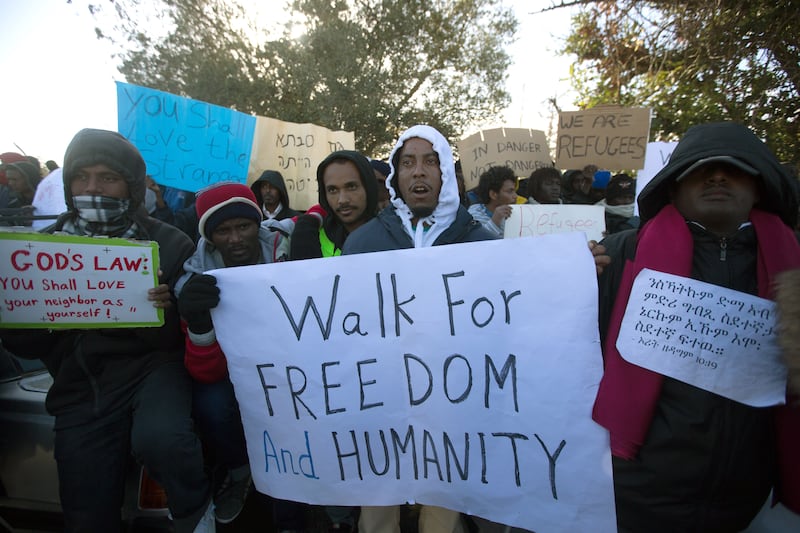 articles/2013/12/19/after-fleeing-war-and-genocide-african-refugees-in-israel-march-for-freedom/african-refugees-march-openz_klpnns
