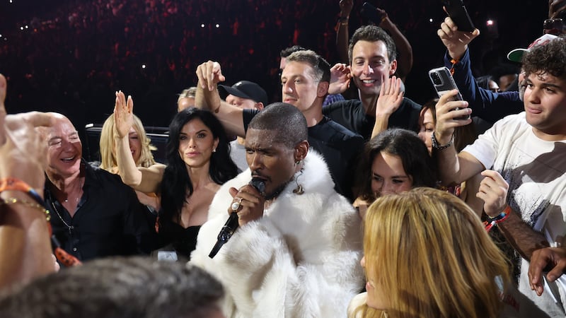 Executive chairman of Amazon Jeff Bezos and Lauren Sánchez are seen while Usher performs onstage during 2024 Usher: Past Present Future Tour at Kaseya Center on December 19, 2024 in Miami, Florida.