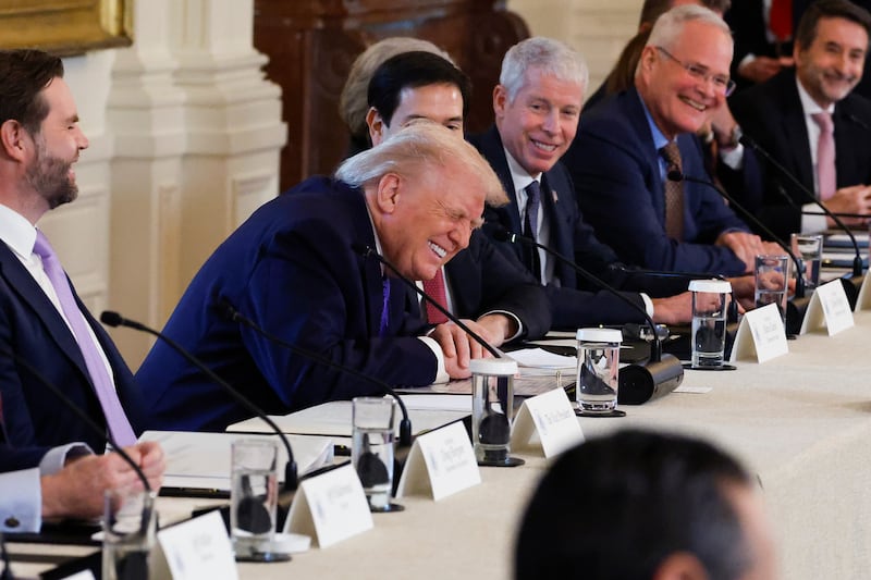 WASHINGTON, DC - JANUARY 09: U.S. President Donald Trump (C) reacts during a meeting with oil and gas executives in the East Room of the White House on January 9, 2026 in Washington, DC. Trump is holding the meeting to discuss plans for investment in Venezuela after ousting its leader Nicolás Maduro. (Photo by Chip Somodevilla/Getty Images)
