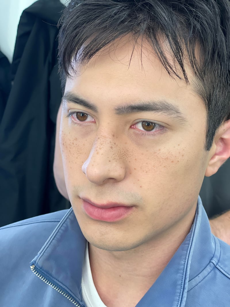 Hudson Williams's faux freckles behind the scenes on 'Heated Rivalry.'