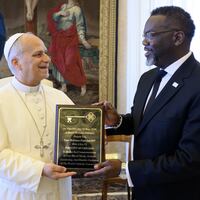 Pope Leo gets the keys to the city from Chicago Mayor Brandon Johnson.