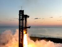 SpaceX rocket, Super Heavy, returns to its launch pad after lifting off.